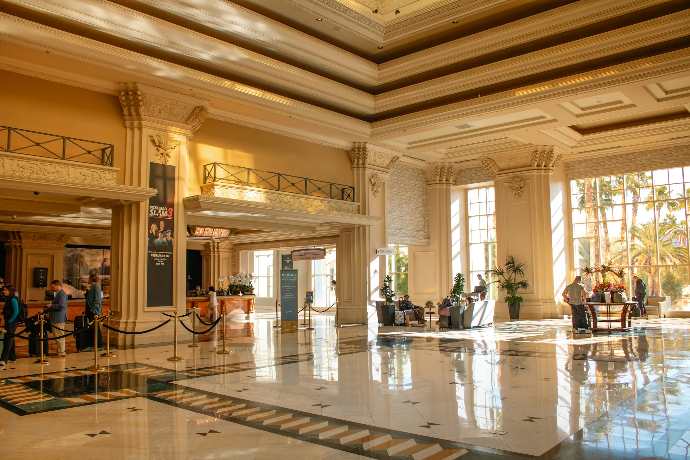 Elegant hotel lobby with reception staff
