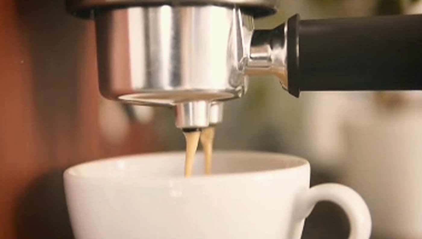 Barista pouring latte art